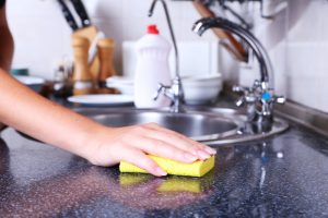 How do I disinfect my kitchen sink?