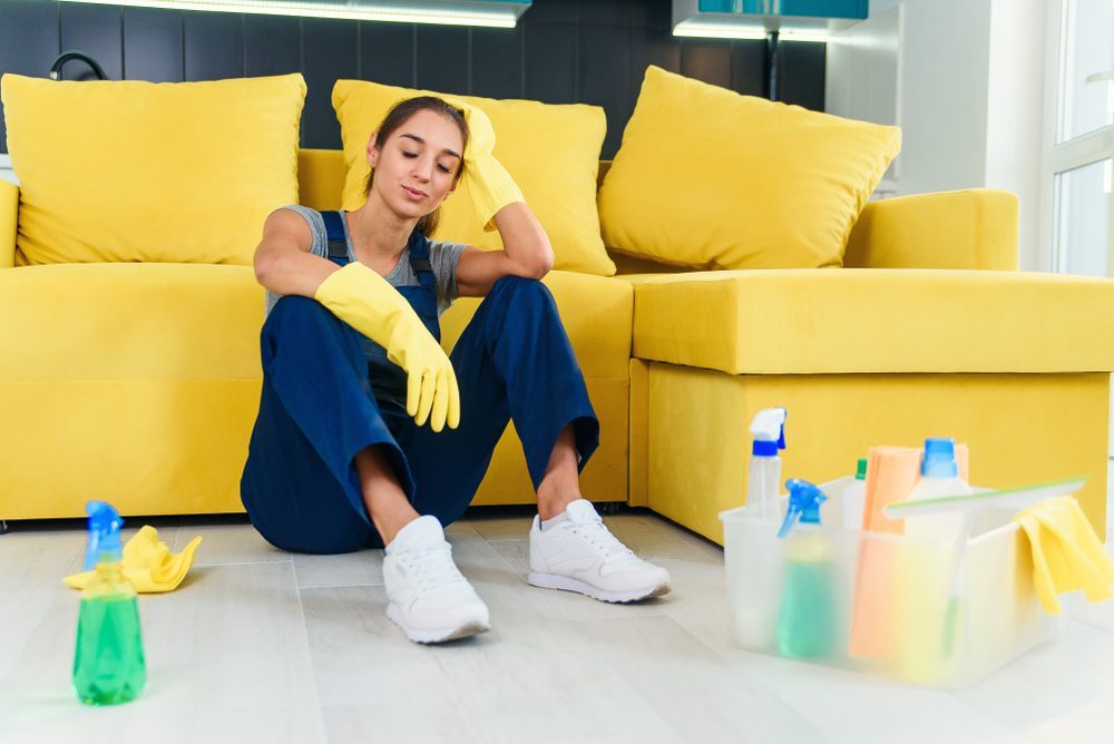 Unprofessional Move Out Cleaner Taking a Break From Cleaning a Home
