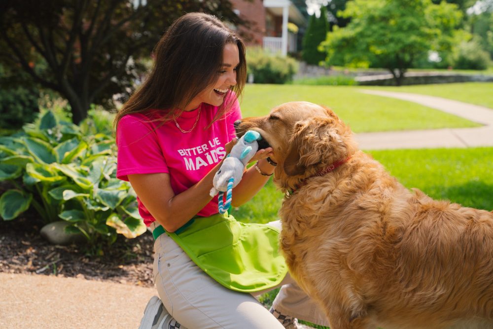 Better Life Maids' House Cleaner Interacting With An Owners Pet