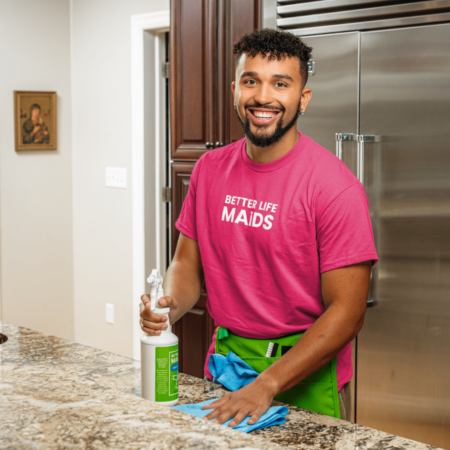 better life maids technician cleaning countertops with eco product
