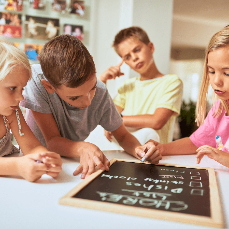 kids writing a list of chores together 