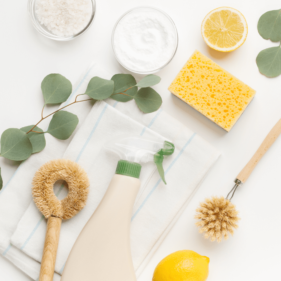 cleaning kitchen with Diy solution scrub brushed and lemon for extra power