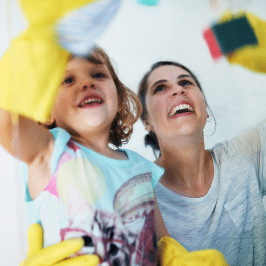 mother and daughter working together to learn about cleaning 