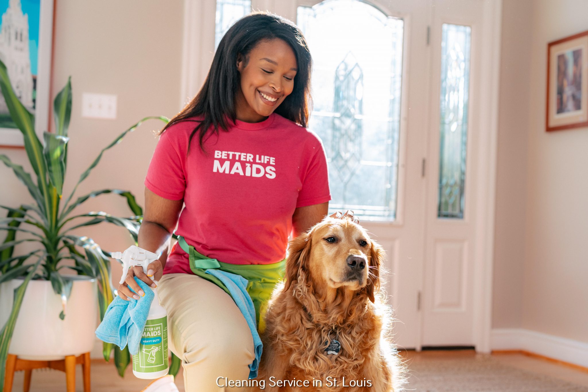 better life technician petting a dog