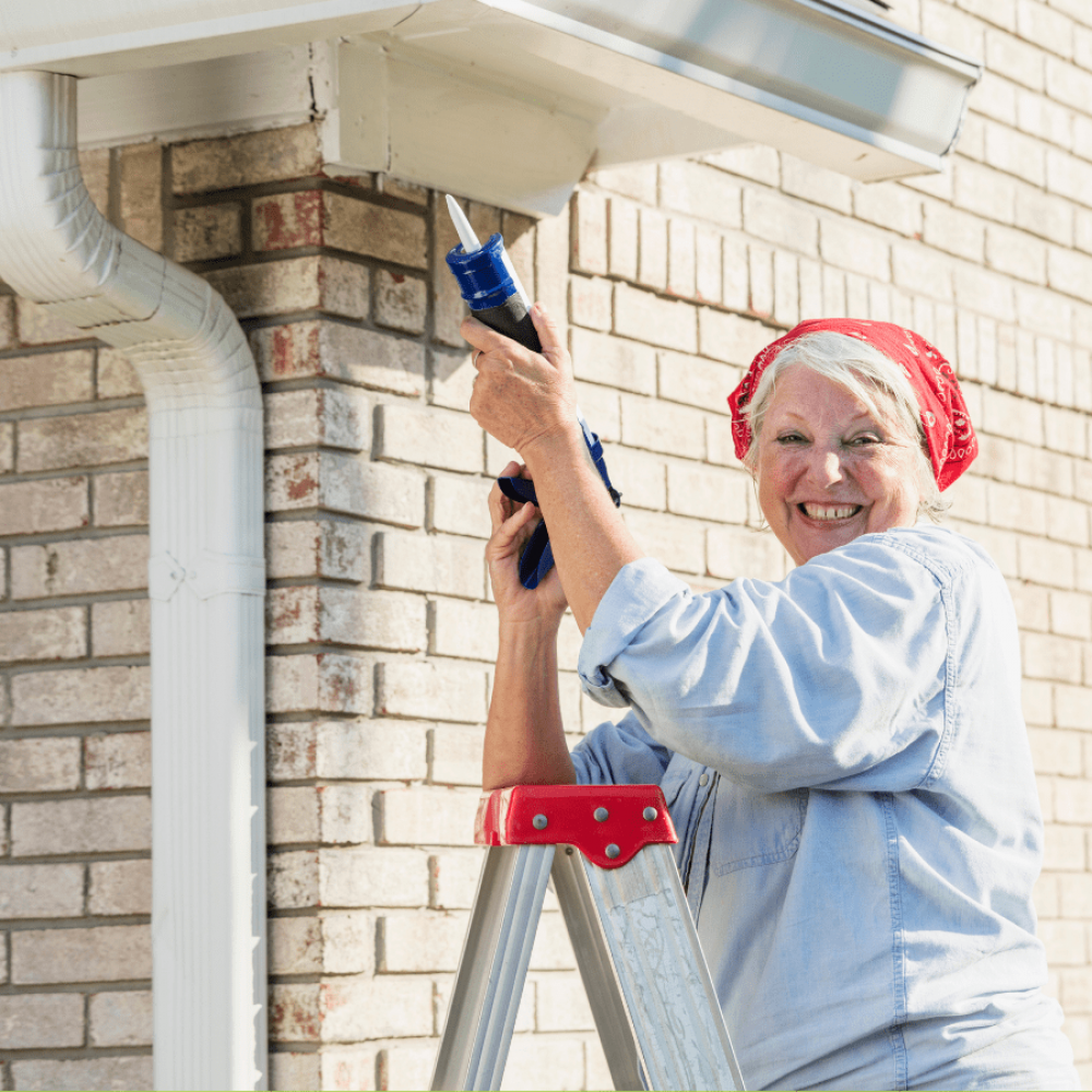 woma repairing the seals of her gutters